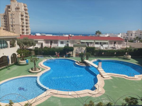 Très bel appartement à Torrevieja avec piscine et à deux pas des restaurants et de la plage